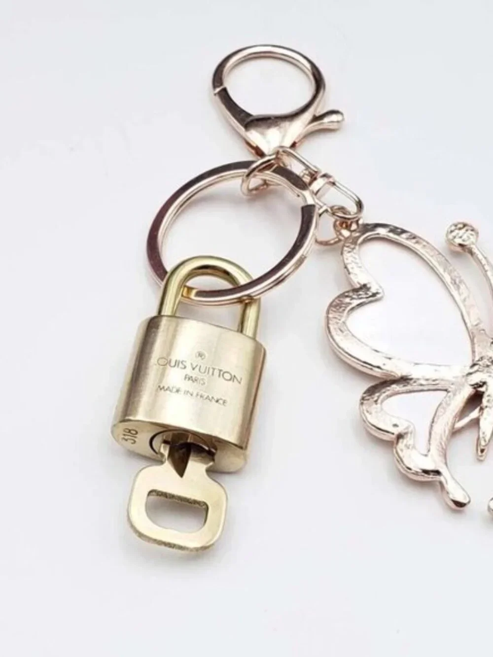 Authentic Louis Vuitton Gold Lock 🔒 Unbranded Butterfly Keychain Bag Charm LV